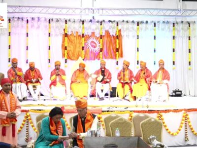 Eight Acharyas with Swami as Head on the stage